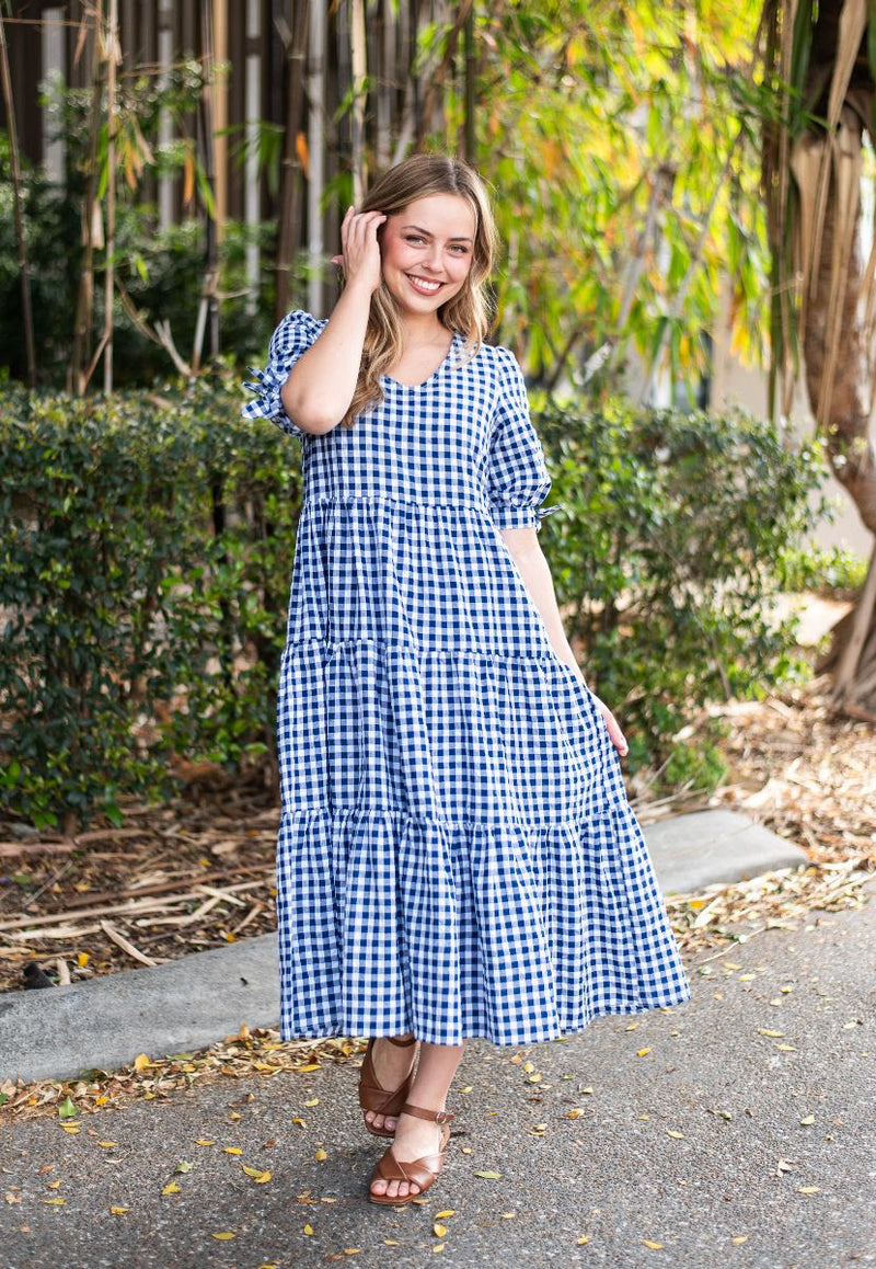 Gingham Tiered Navy Dress Molly May's Boutique Gingham Tiered Navy Dress Molly May's Boutique